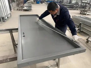 Stage 2 in-process dimensional check of door leaf components during fabrication