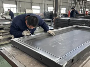 Stage 3 weld integrity inspection on fire door perimeter seam welds