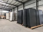 Building materials distribution warehouse stocking steel doors for contractor supply